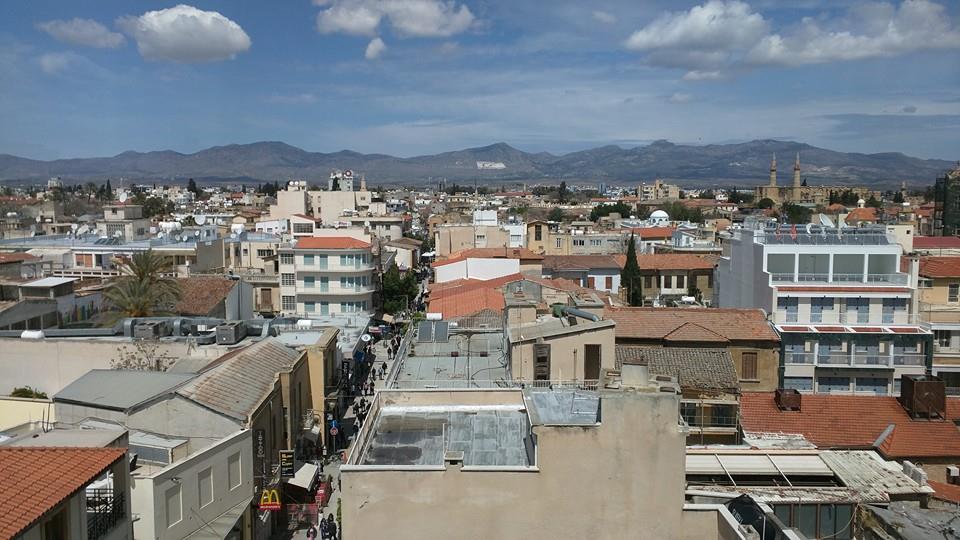 View of Northern Cyprus from the Shakolas Observatory on Ledra Street, Nicosia, in Greek Cyprus.  You can see the Turks have painted a HUGE Turkish flag on the mountain, to mock the Greeks. 